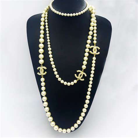 chanel leather interlaced gold chain|Chanel pearl necklace price list.